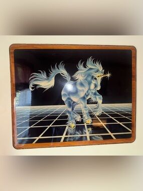 Runing White Unicorn by Sue Dawe
Poster from 1982